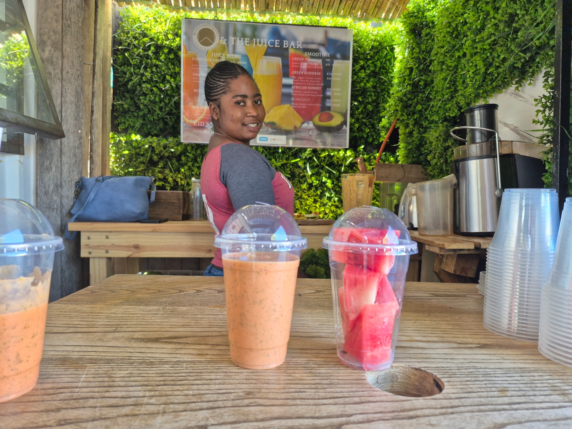 Fresh smoothies and watermelon cups on the bar counter